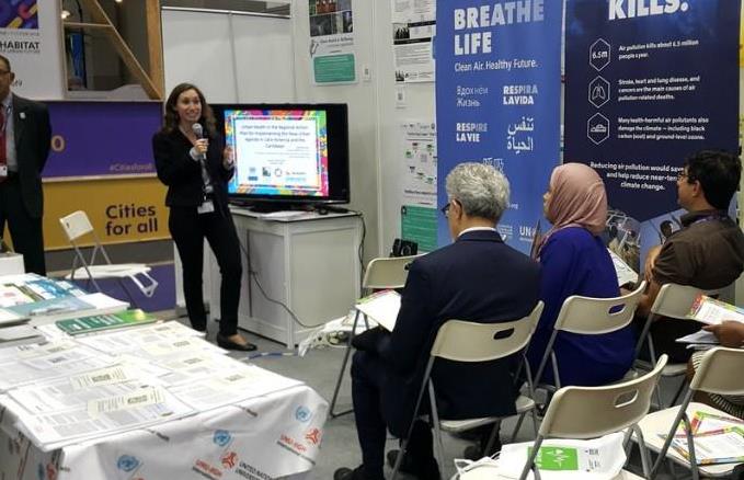 Photo of a women speaking to an audience